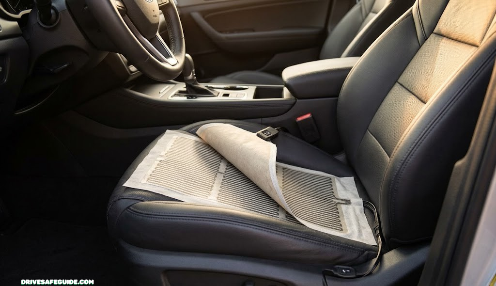 Close-up of a heated seat cushion with warming pad visible inside a car seat